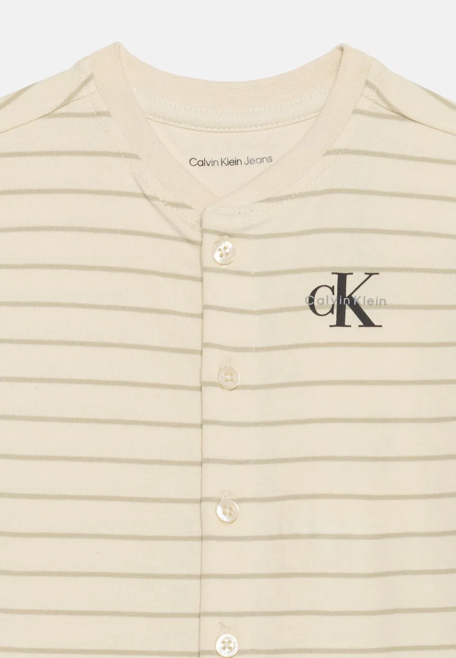 Комбинезон Calvin Klein Jeans кремового цвета — фото 3