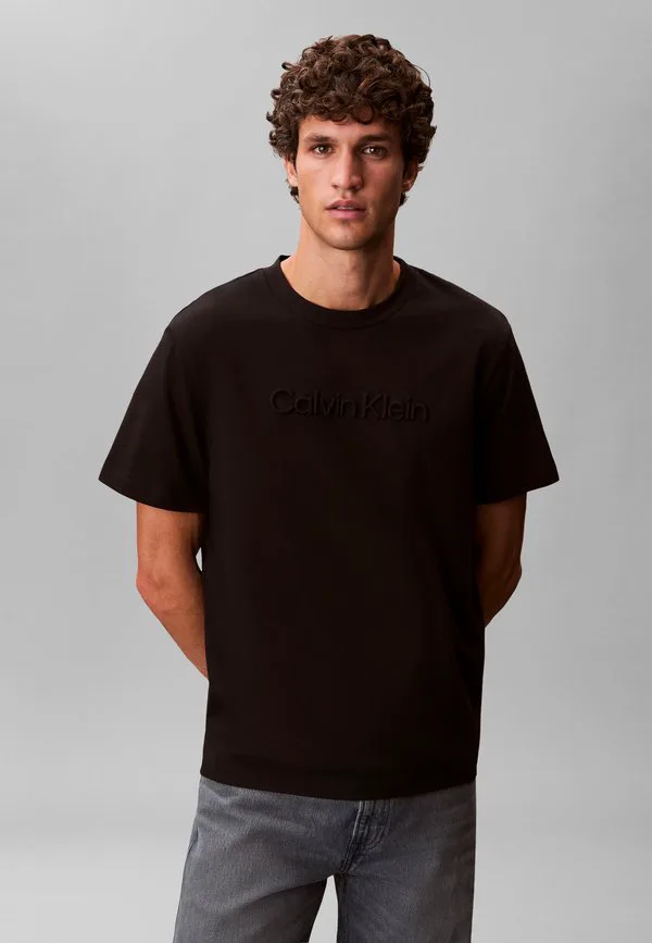 Оптовая продажа спортивной одежды, футболки с графическим принтом. Calvin Klein, Black