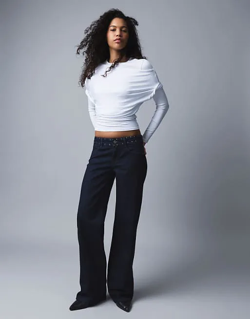 

Синие мешковатые джинсы с заклепками Bershka с низкой посадкой