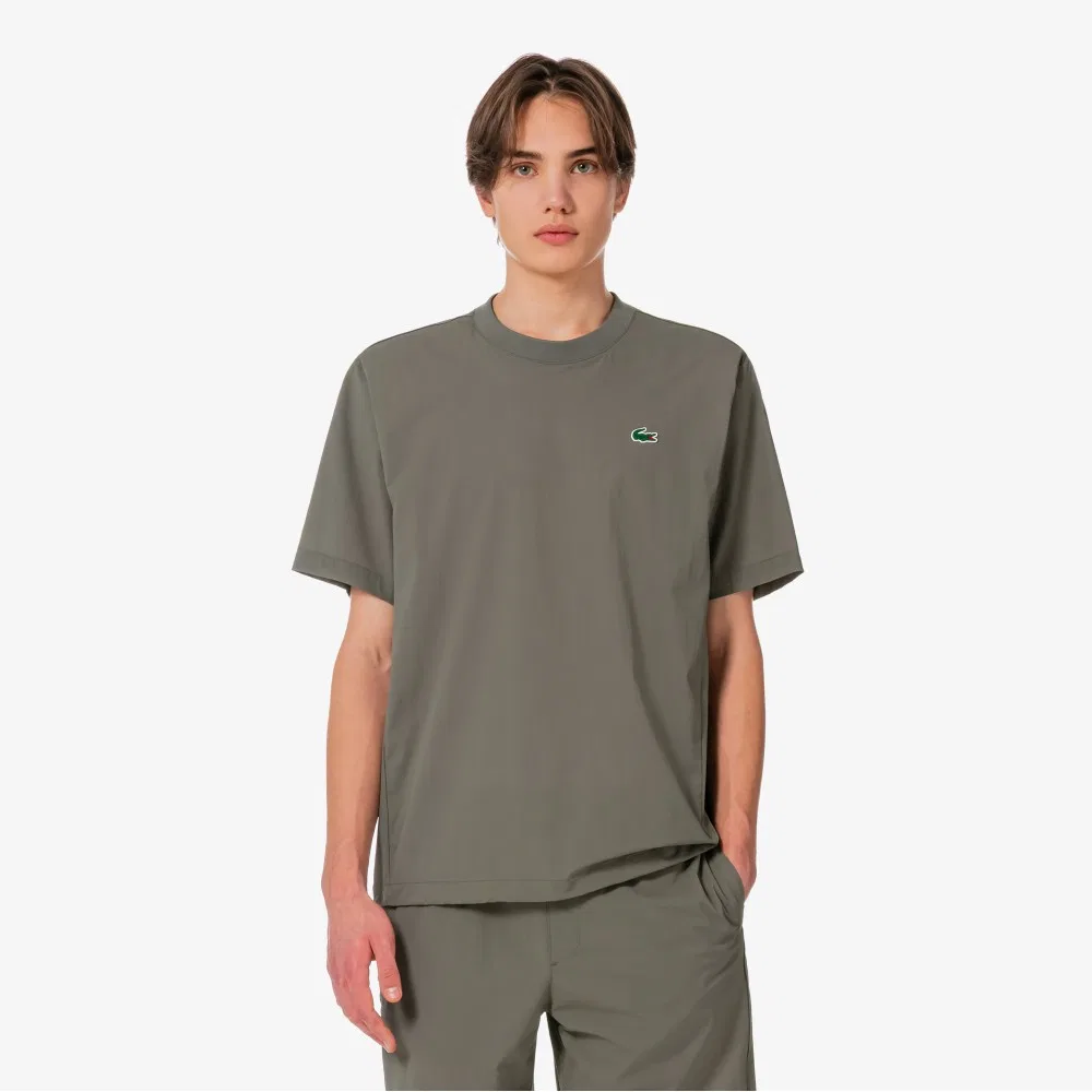Мужская теннисная футболка-писте из тканого материала цвета хаки от Lacoste