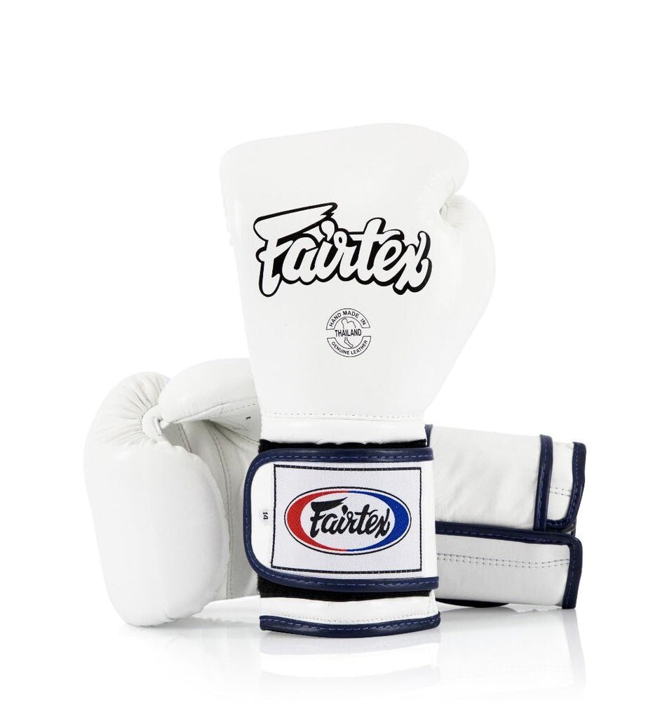 

Боксерские перчатки Fairtex Heavy Hitter's - Mexican Style, Blue Piping, 14 oz., белый