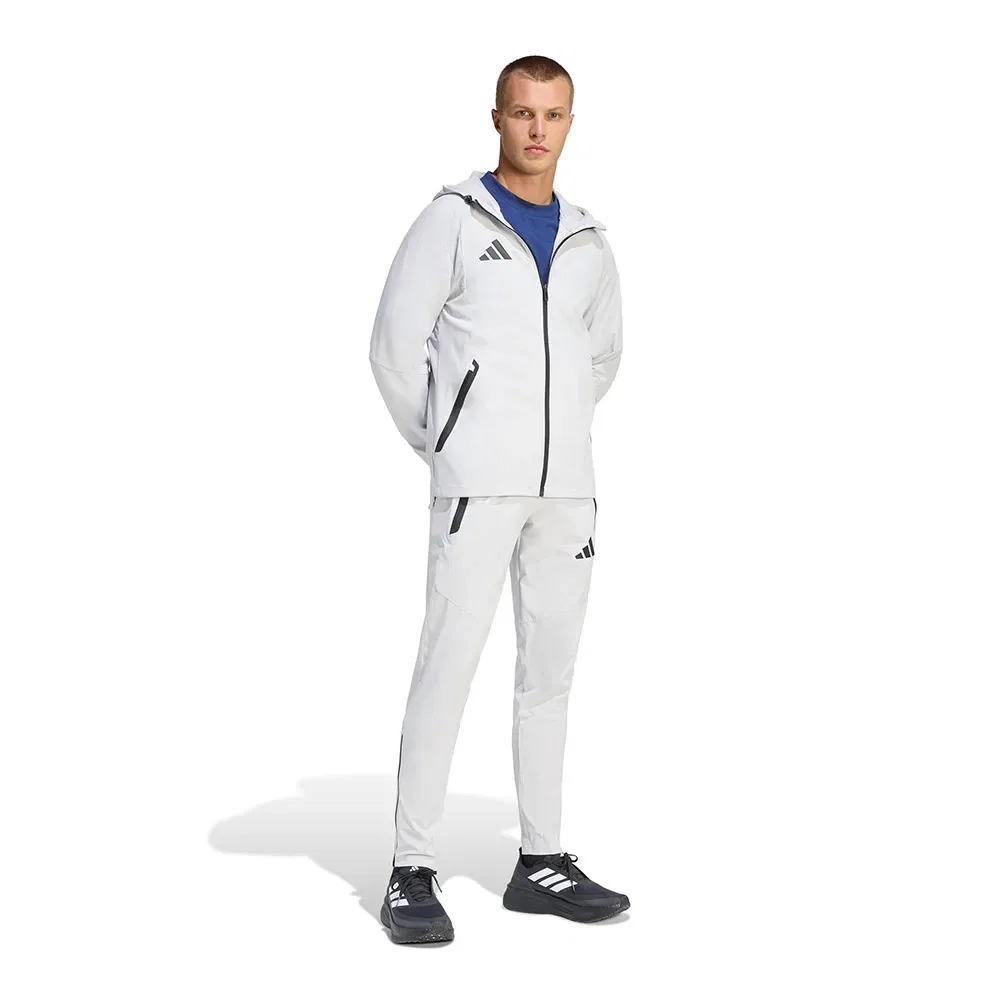 Мужские спортивные брюки с боковыми карманами на молнии Adidas Tiro Travel Woven, Grey — фото 4