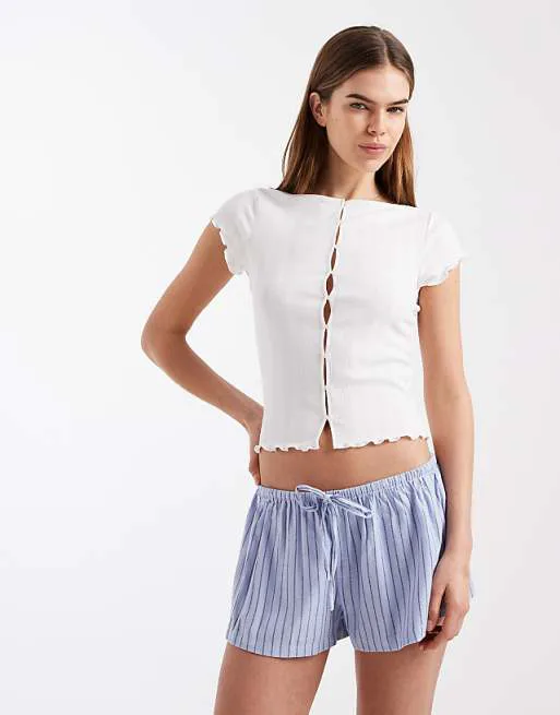 

Фланелевые шорты в шоколадно-сливовую полоску Cotton On для девушек