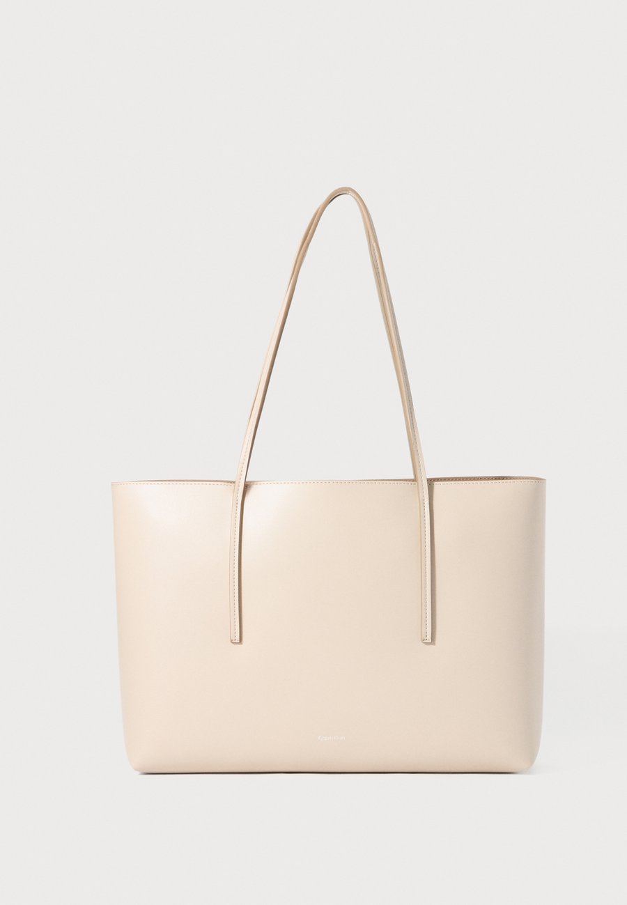 

Сумка-шоппер Calvin Klein FOIL LOGO TOTE, Chateau/Desert Taupe/Brown