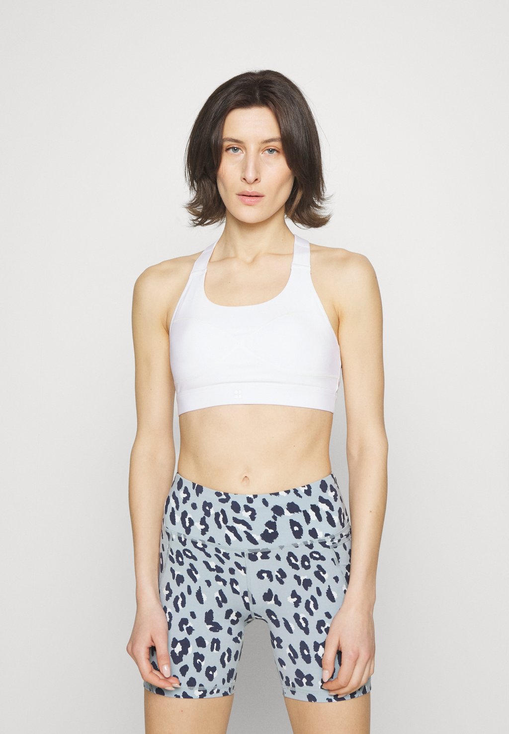 

Спортивный бюстгальтер средней поддержки POWER MEDIUM SUPPORT BRA Sweaty Betty, белый