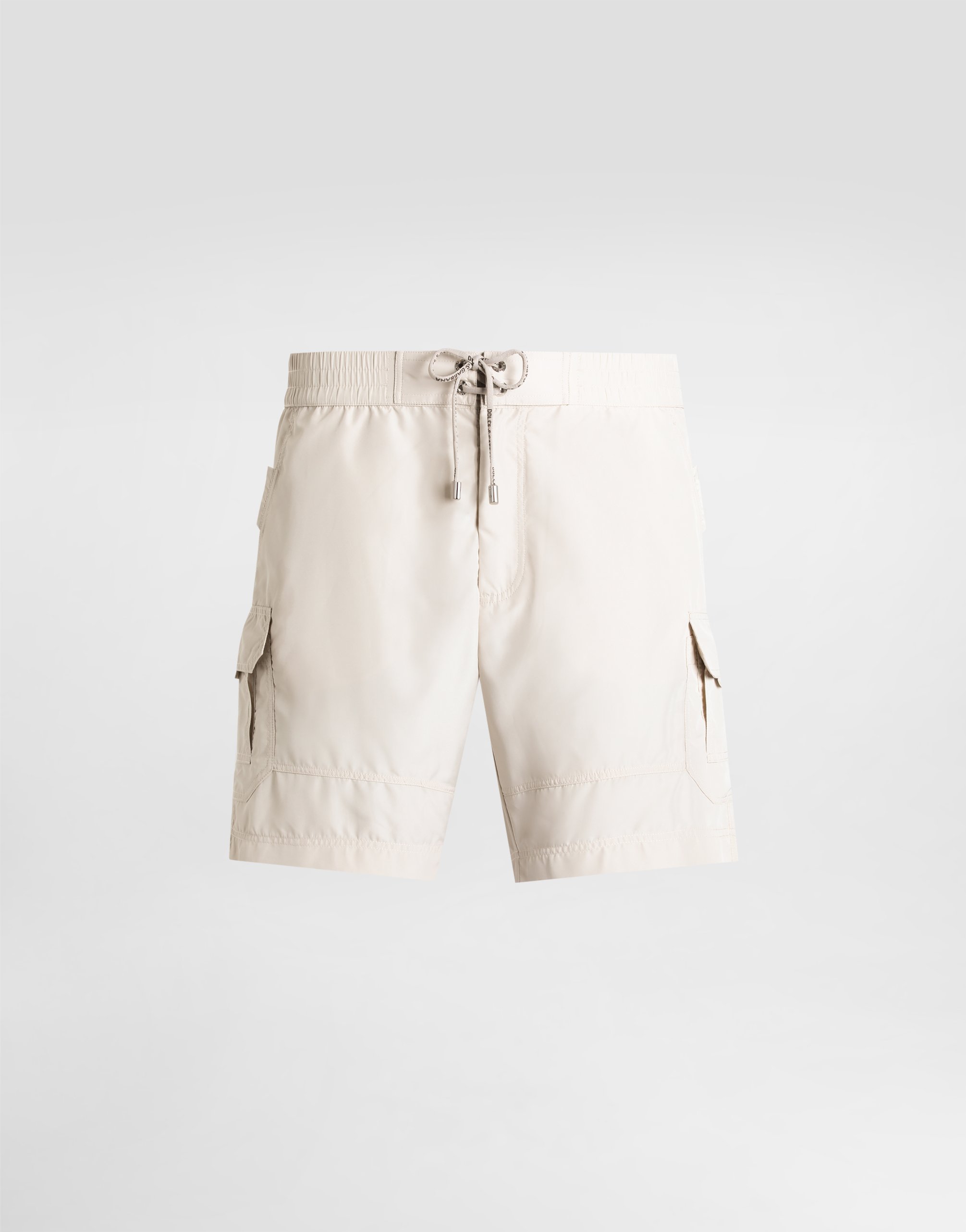 

Плавательные шорты средней длины с биркой Dolce & Gabbana, бежевый