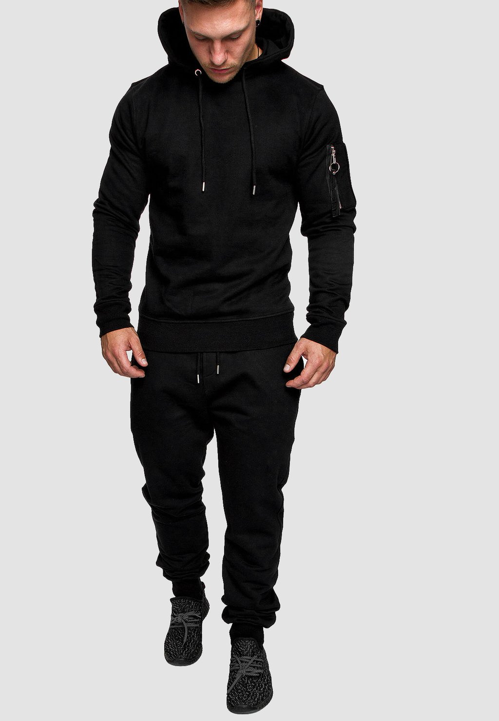

Спортивный костюм BASIC JOGGING MIT ARMTASCHE SPORTLICH BEQUEM SET Humy, черный