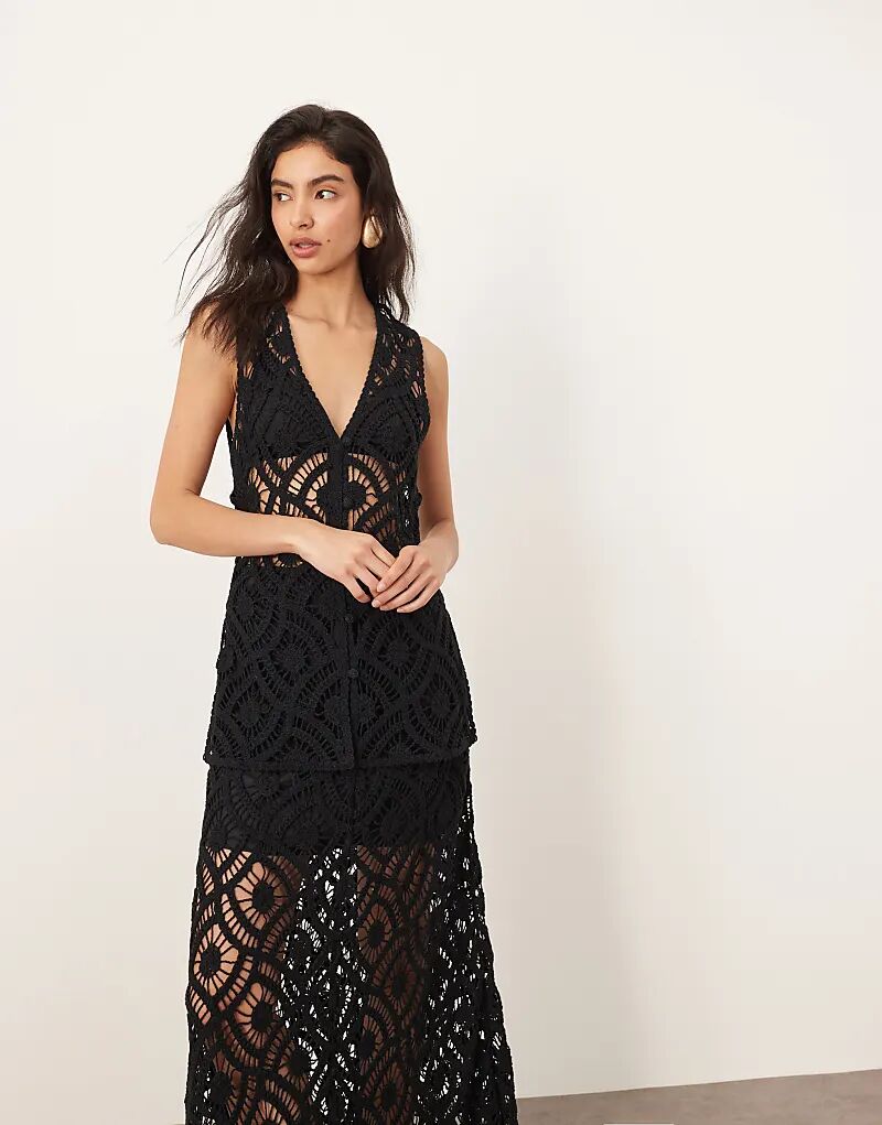 

Рубашка, длинная пуговица через верхнюю часть черного цвета