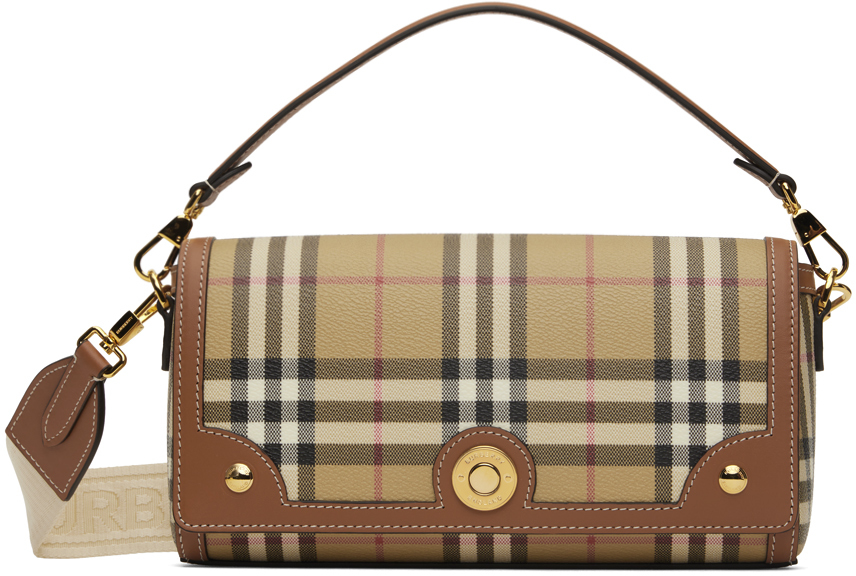 

Сумка через плечо бежевого цвета с небольшой заметкой Burberry