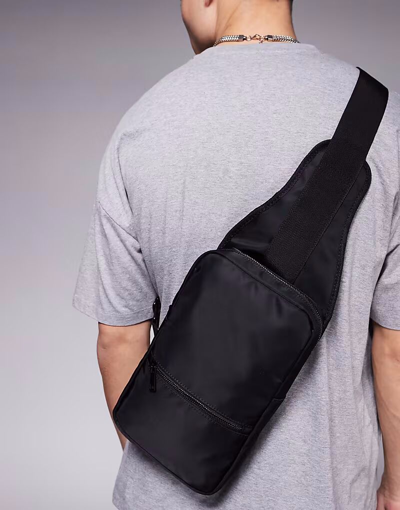 

Маленький нейлоновый рюкзак через плечо ASOS DESIGN черного цвета