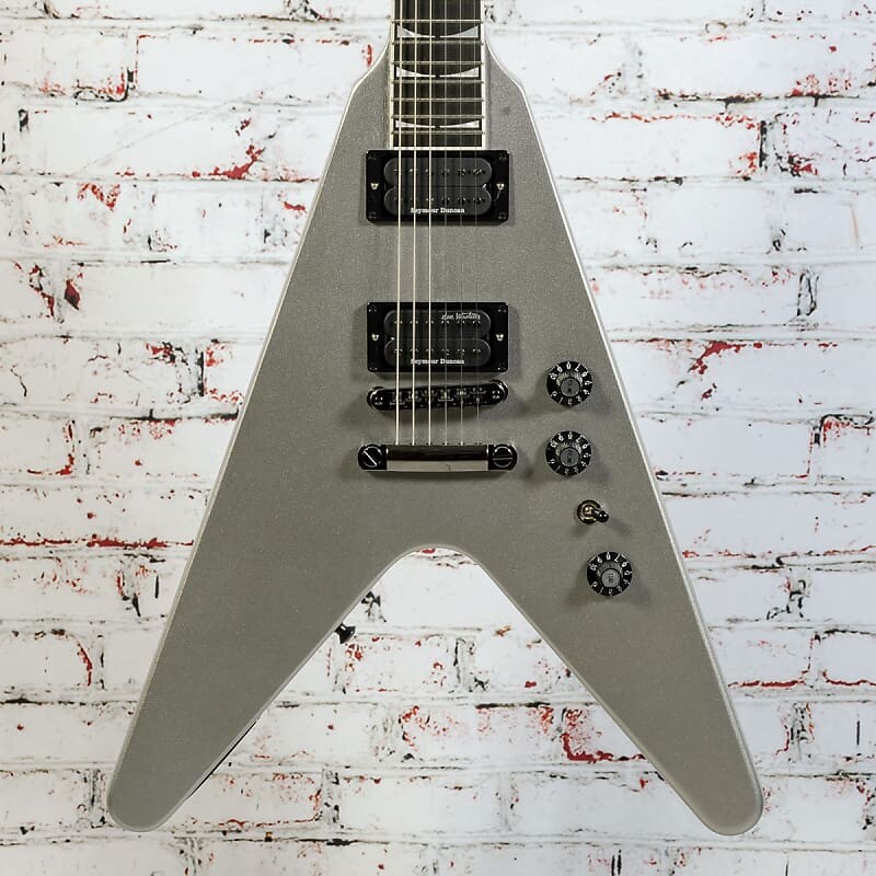 

Электрогитара Gibson - Dave Mustaine Flying V EXP - Electric Guitar - Metallic Silver - w/ Custom Hardshell Case with Dave Mustaine Silhouette - x0186