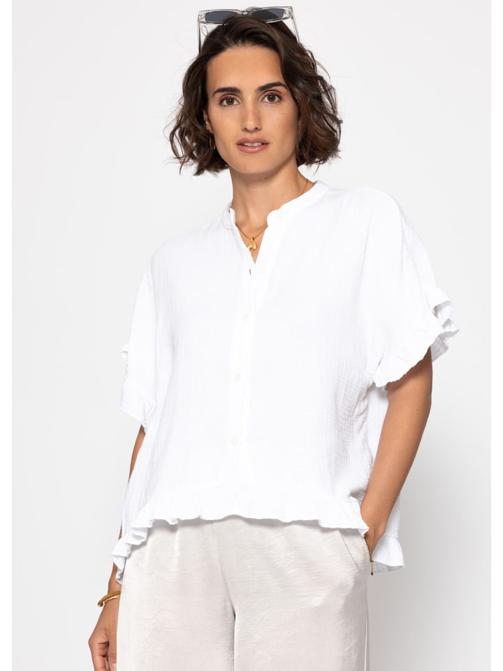 

Муслиновая блузка с оборкой по низу белого цвета SASSYCLASSY