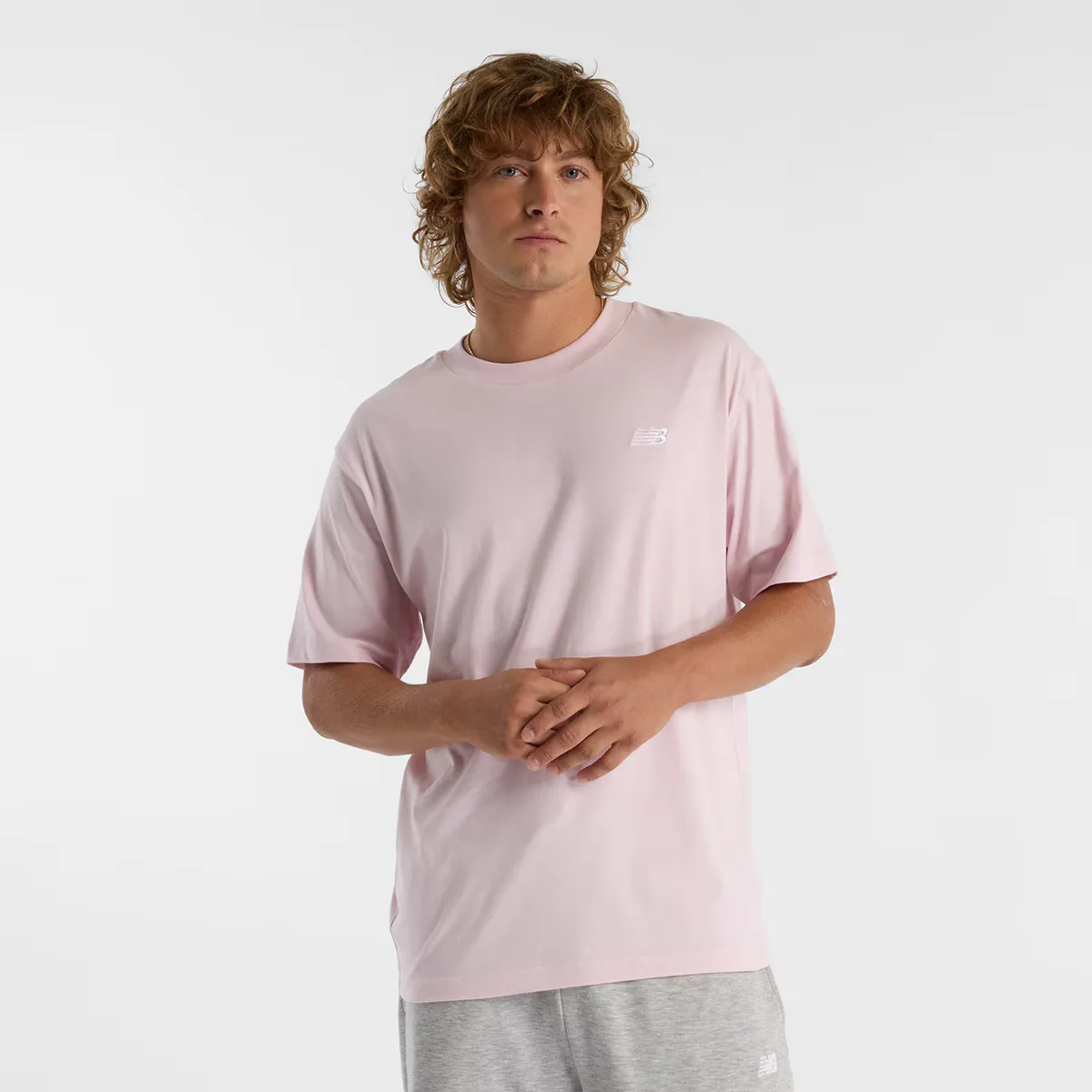 

Мужская футболка New Balance MT41509RSG, цвет Rosa claro