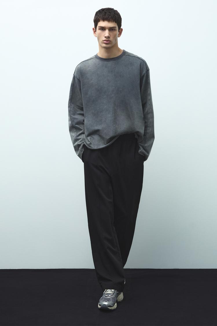

Эластичные брюки-джоггеры по индивидуальному заказу Pull And Bear, черный