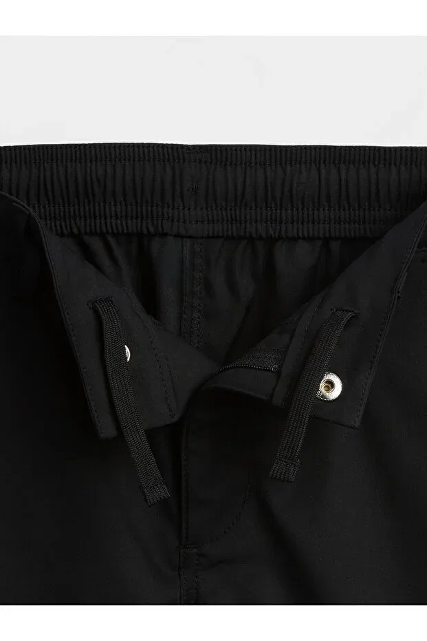 Детские брюки для мальчиков черные Gap, Color Black-000 — фото 2