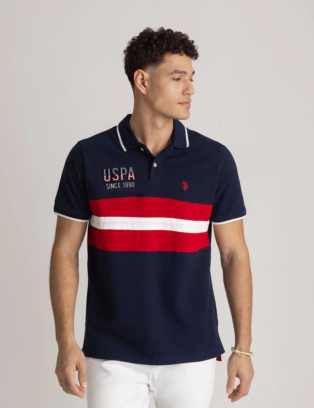 

Футболка-поло U.S. Polo Assn Colorblock Embossed Pique, темно-синий