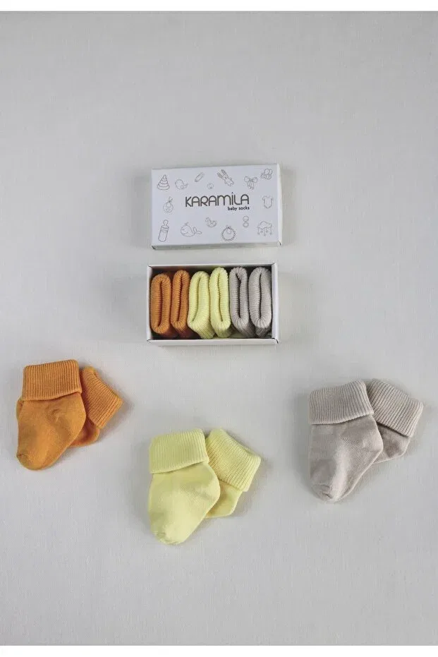 Детские носки для новорожденных с принтом 3-Piece baby socks Karamila, Yellow-Orange-Stone — фото 3