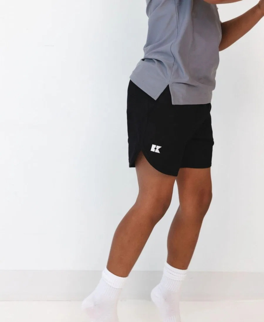 Шорты с защитой от ультрафиолета для мальчиков Boys' 2T-16 Super Short Courtside Kids, Black — фото 2