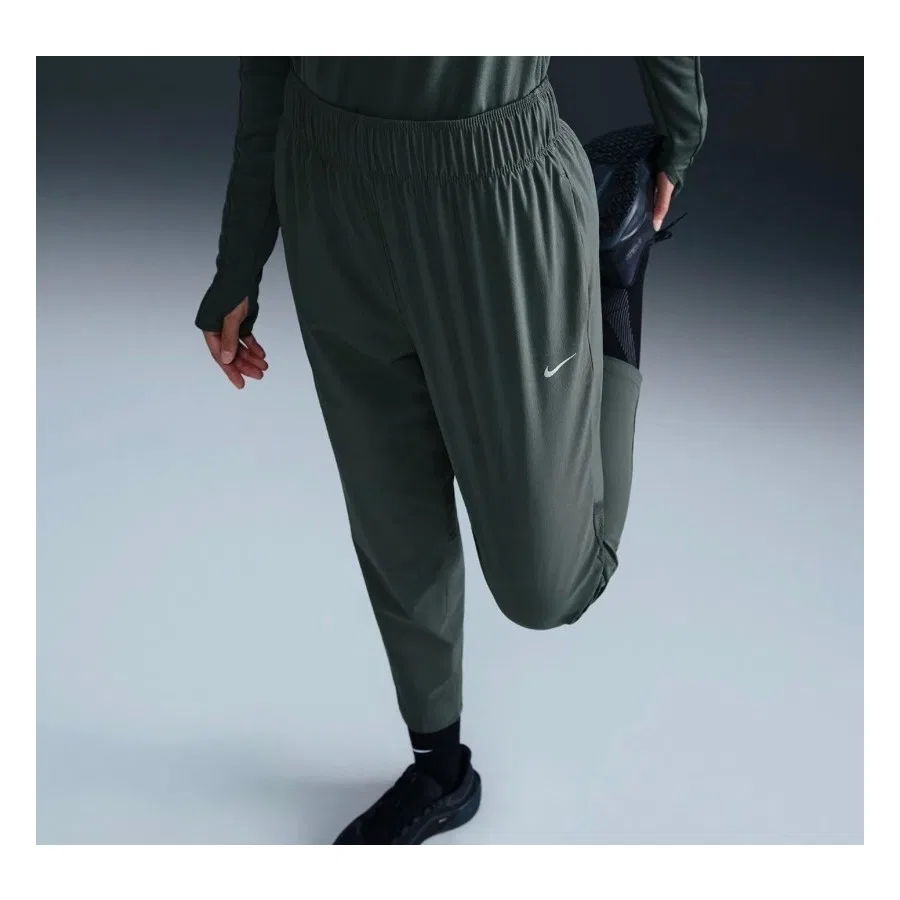 Спортивные брюки с высокой посадкой Nike Dri-FIT Fast Mid-Rise 7/8, Зеленый — фото 2