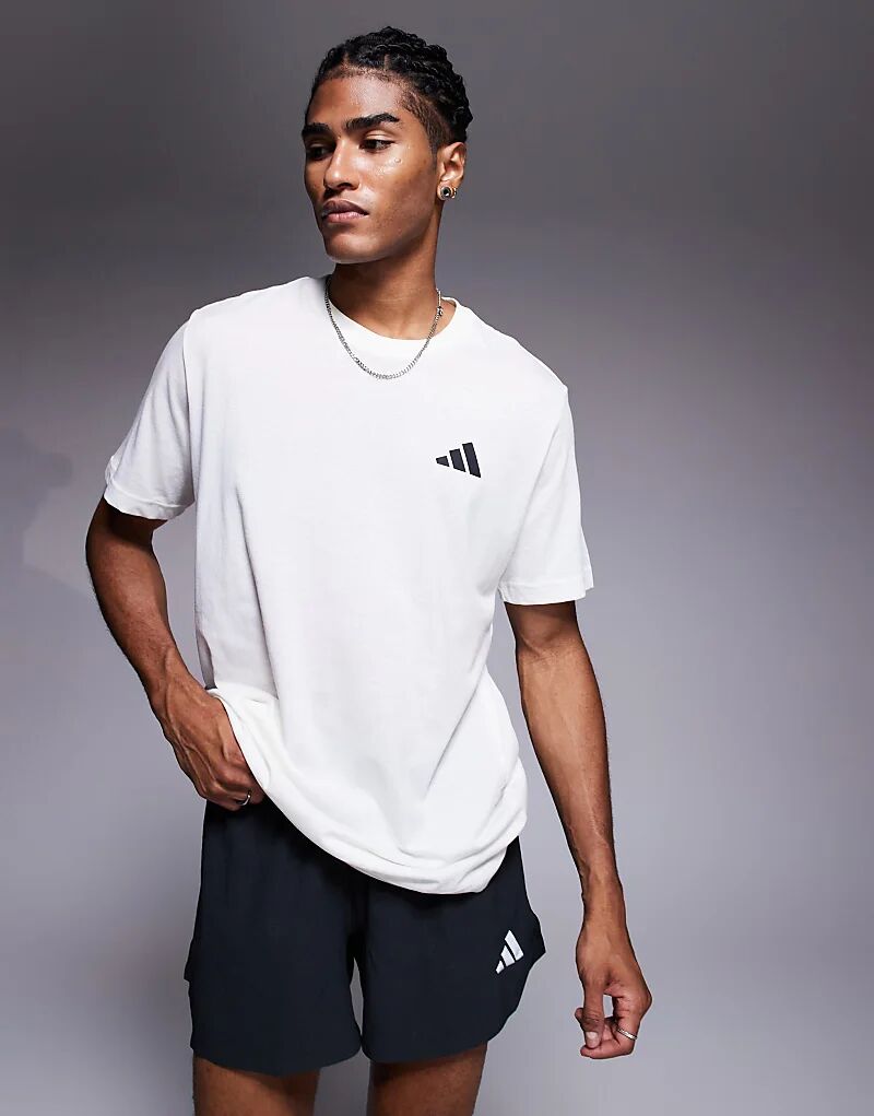 

Футболка для бега adidas с принтом солнца на спине, бежевого цвета Adidas Performance