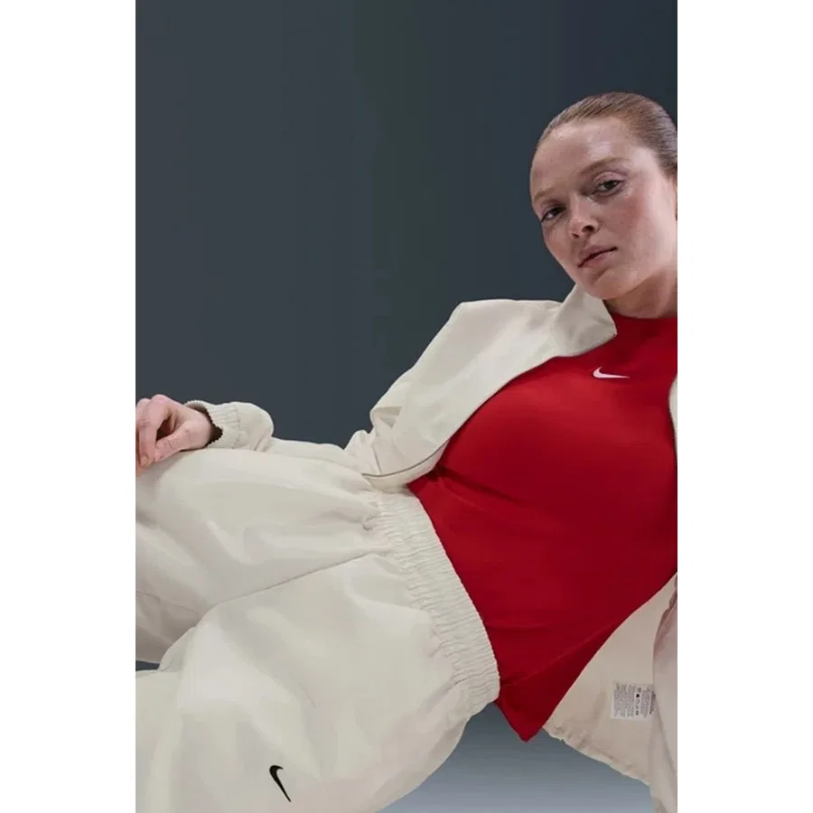 Спортивные брюки с молниями по низу Nike Sportswear Windrunner Women's Shine Trousers, Кремовый — фото 3