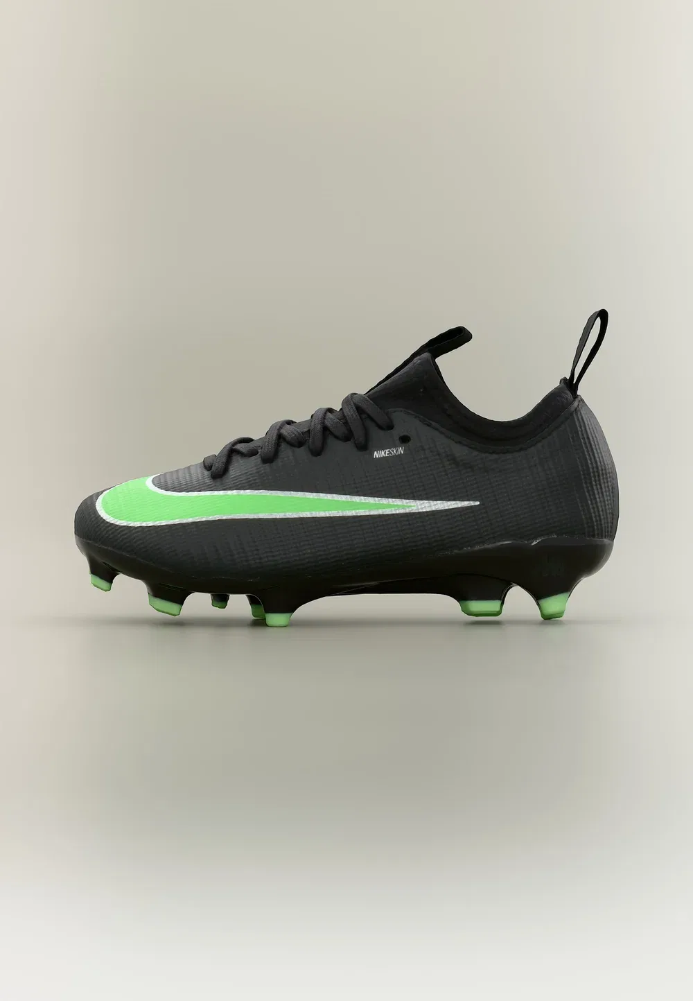 Футбольные бутсы Mercurial Vapor 17 Academy FG унисекс - для твердого грунта Nike Performance, Black/Illusion Green