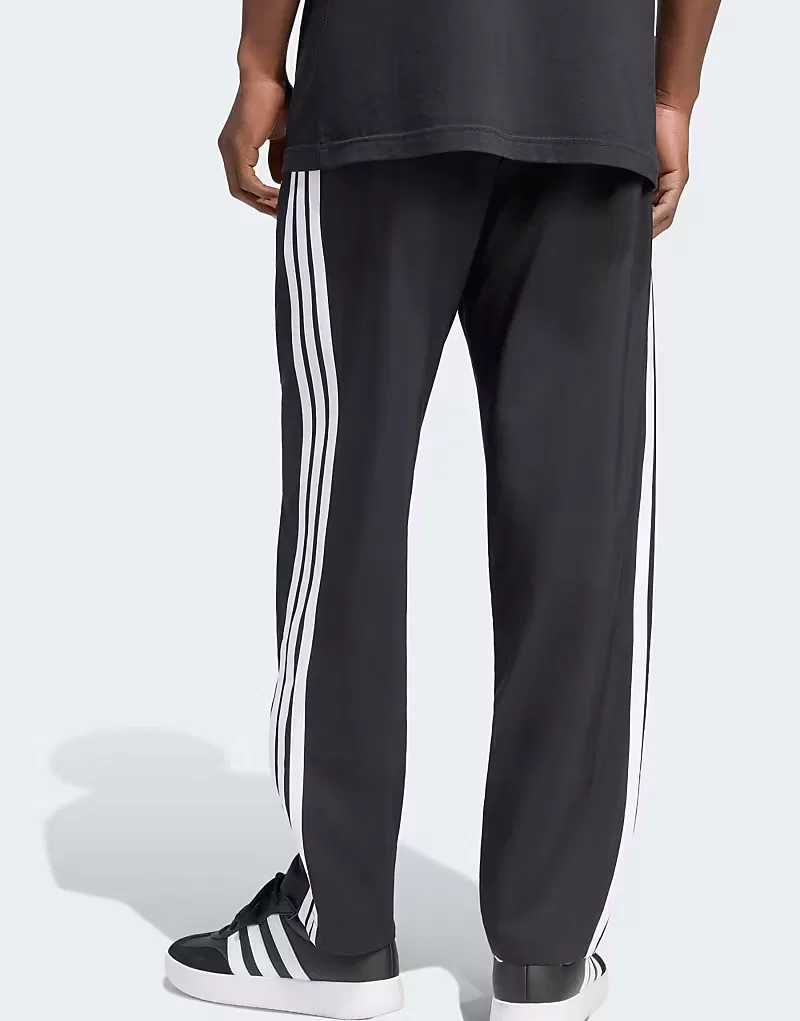 Брюки Adidas Performance Essentials Stanford Lite с тремя полосками, зауженные, с открытым низом, черно-белые — фото 3