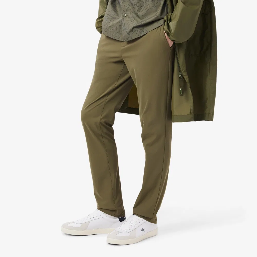 Мужские брюки Commuter цвета хаки от Lacoste — фото 2