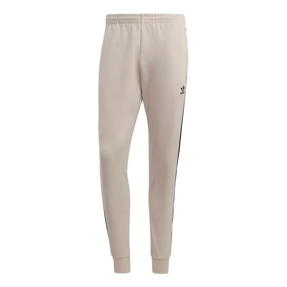 Брюки спортивные с лампасами Adicolor Classics SST Adidas, бежевый