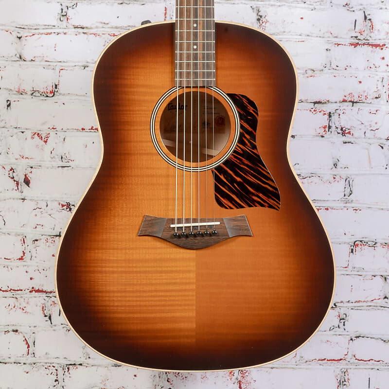 

Taylor AD27E - Акустическая электрогитара - Flame Top - Woodesmoke - x2037 Taylor AD27E - Electric Guitar - - Woodesmoke - x2037