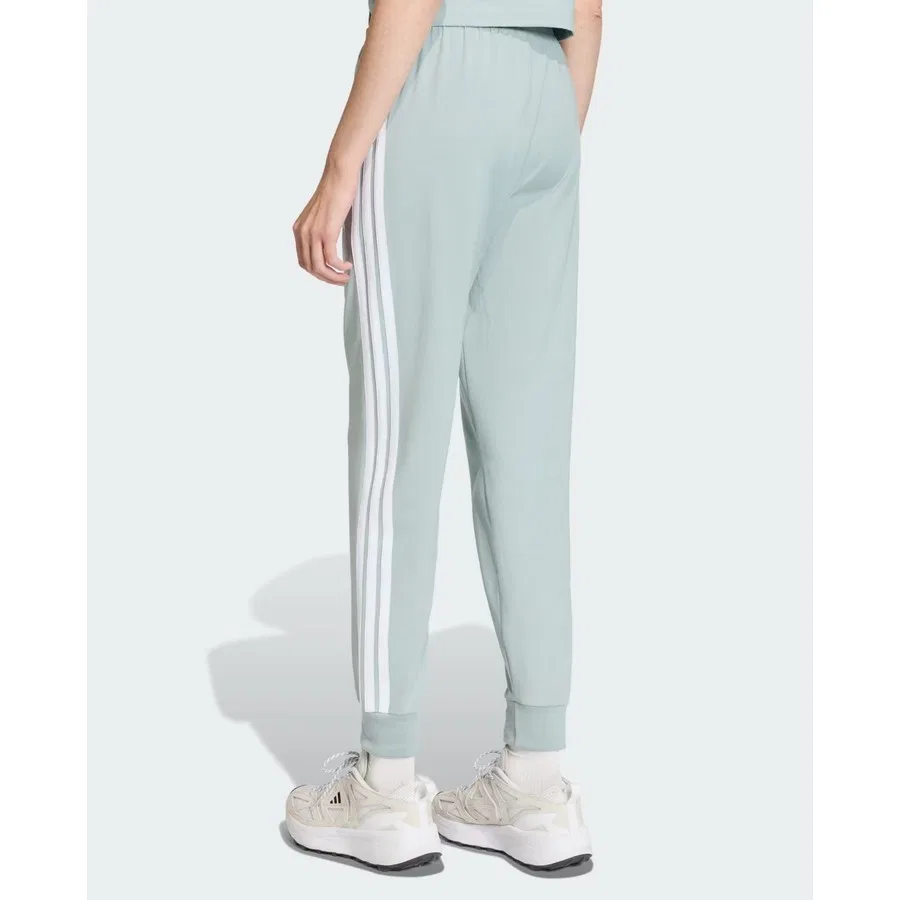 Спортивные брюки с эластичным поясом и манжетами adidas Essentials 3-Stripes Jogger, Wonder Sage / White — фото 2