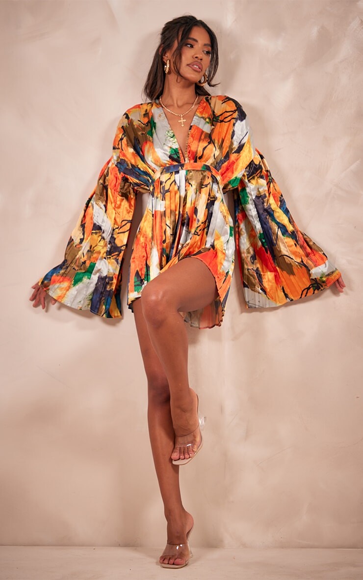

PrettyLittleThing Оранжевый комбинезон со складками и глубоким вырезом