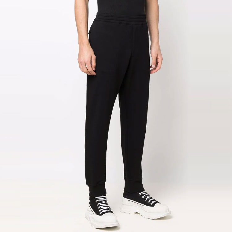 Облегающие хлопковые спортивные брюки Alexander McQueen, черные — фото 3