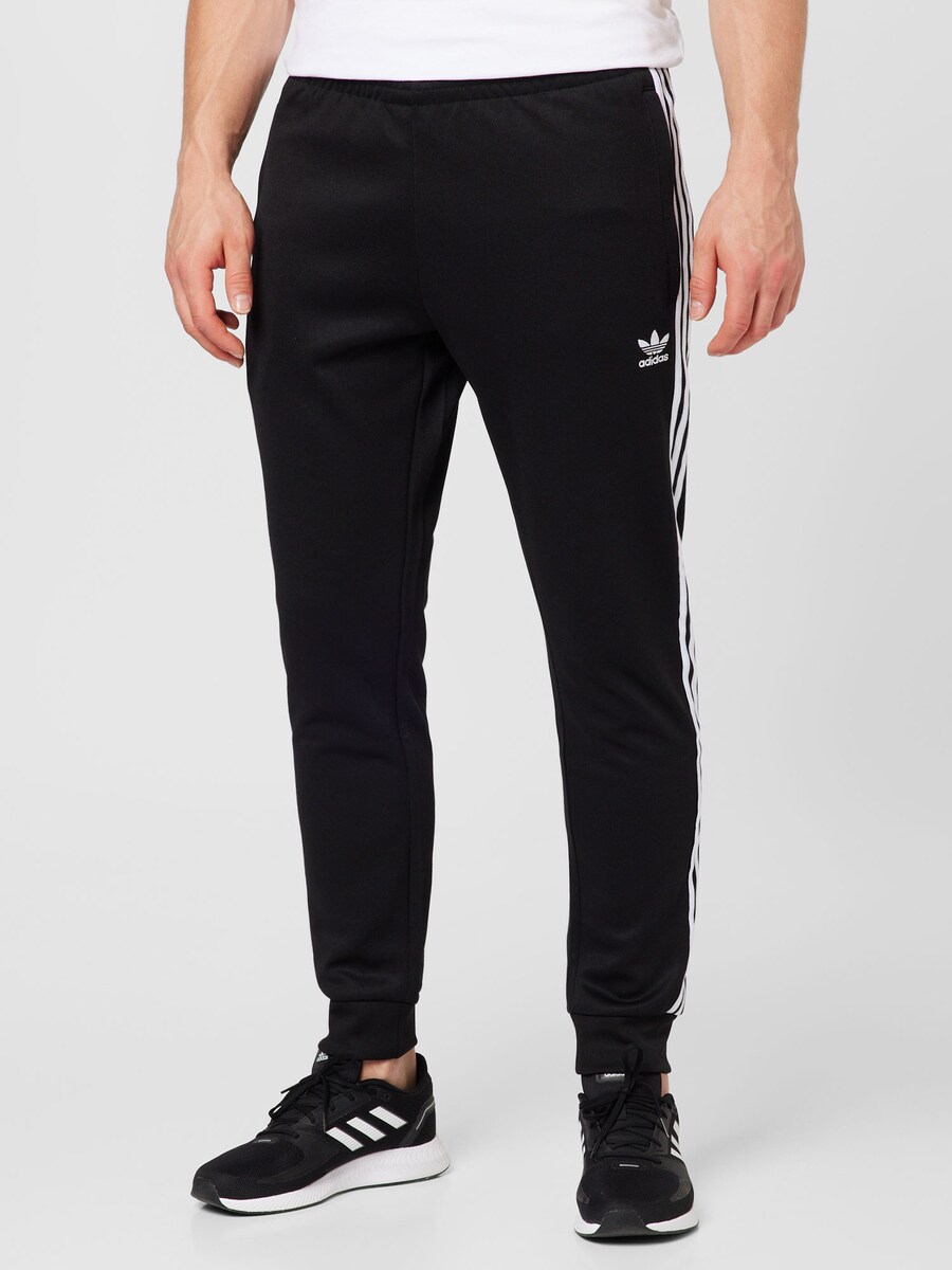Зауженные тренировочные брюки ADIDAS ORIGINALS Adicolor Classics SST, черный — фото 2