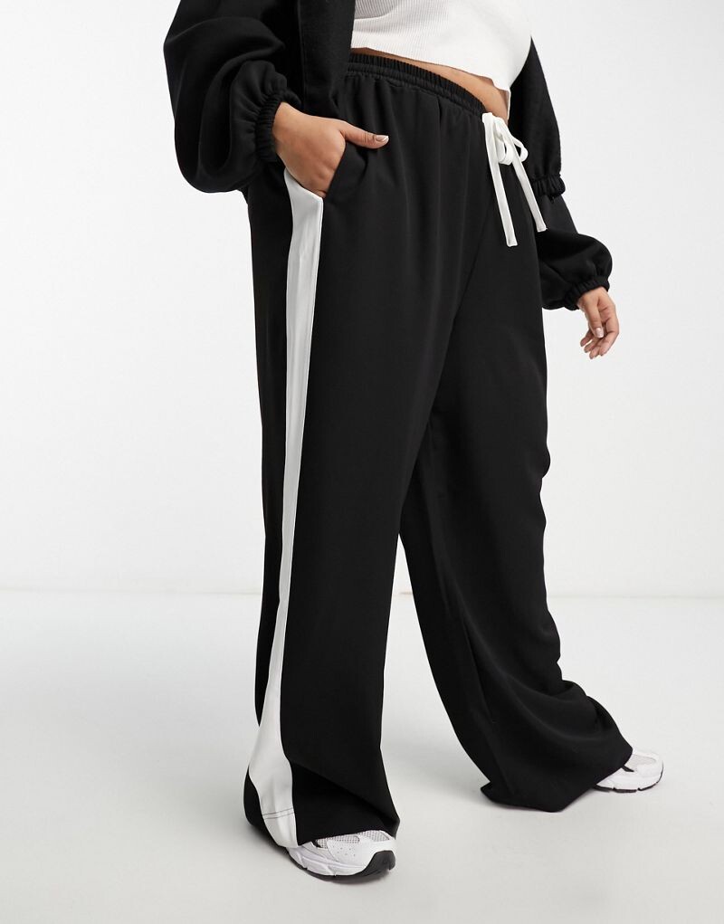 

Черные брюки без застежки с контрастной вставкой ASOS DESIGN Curve ASOS