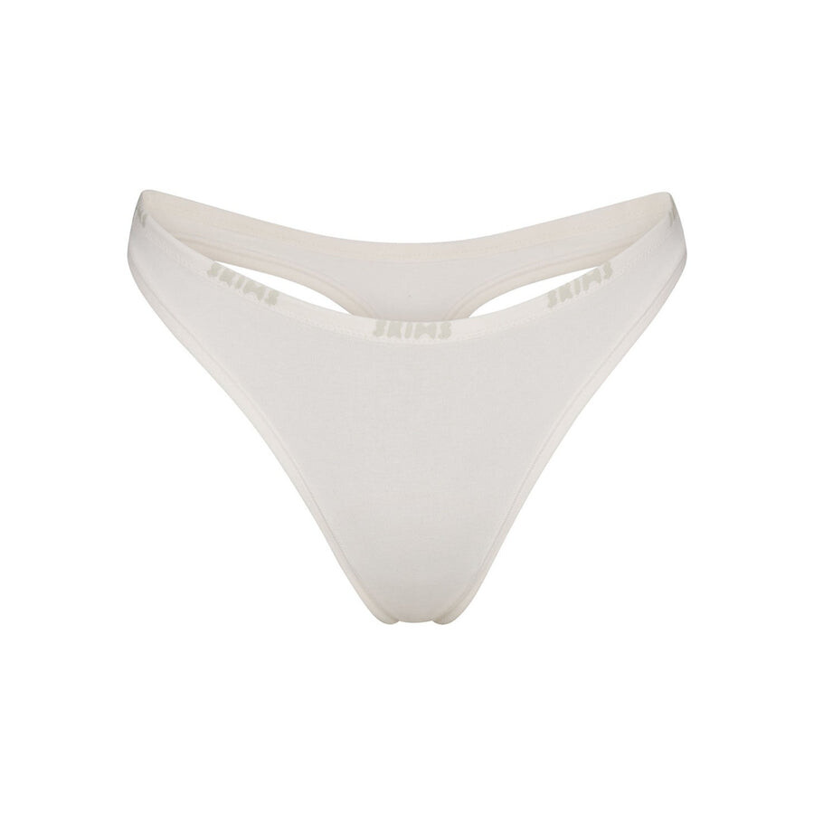 

Стринги с окучиванием SKIMS Cotton Logo, цвет Marble
