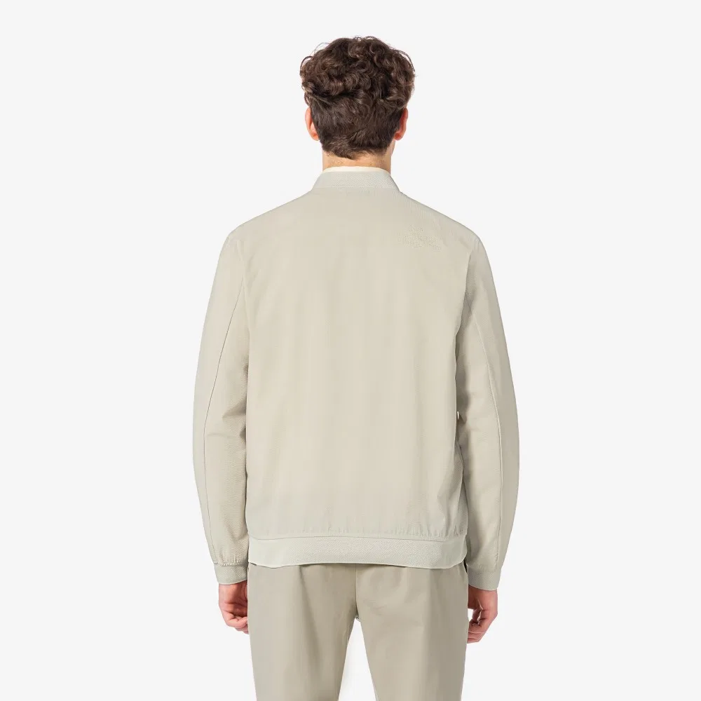 Мужская летняя куртка для гольфа бежевая от Lacoste — фото 3