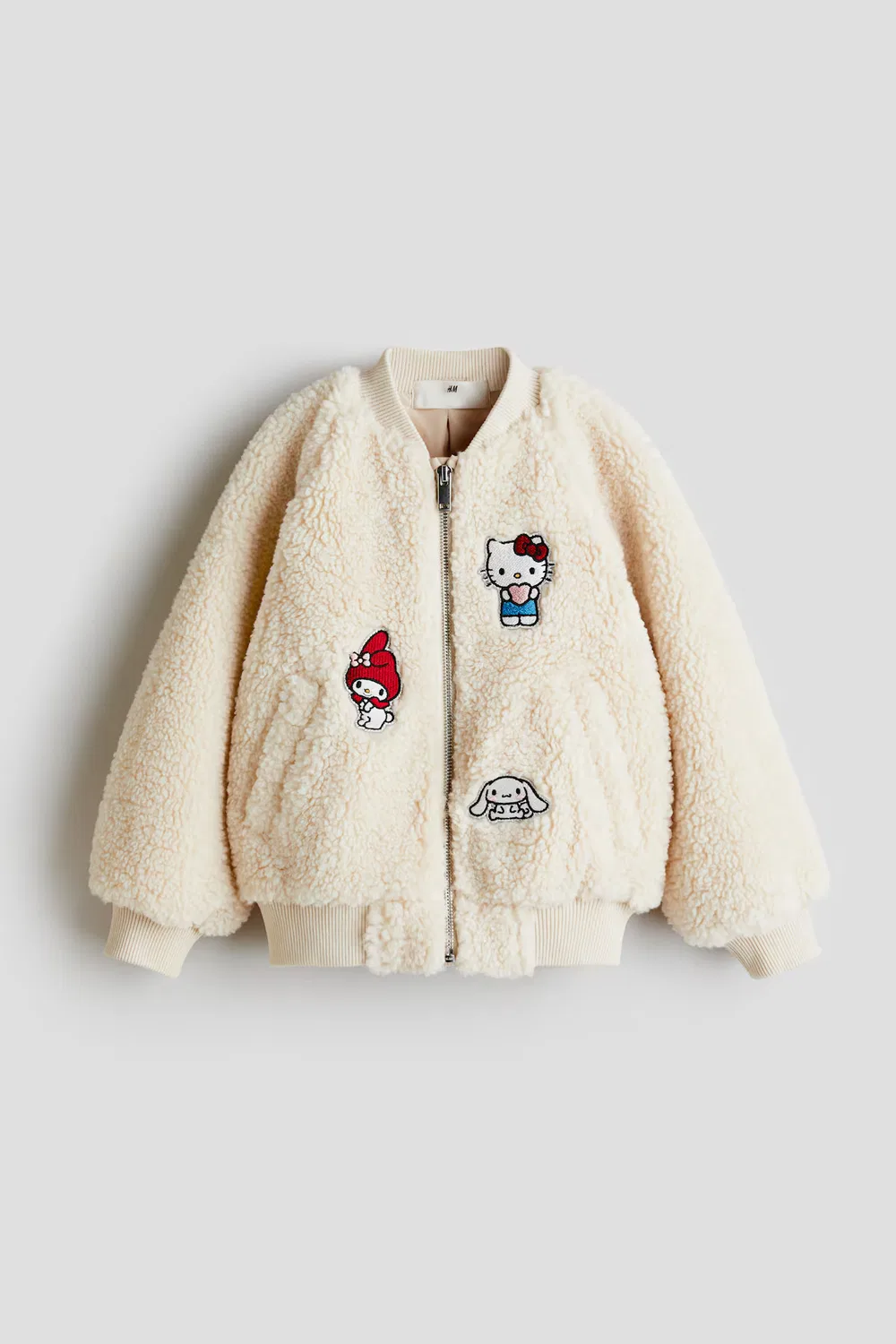 Пилотская куртка из плюшевого флиса с аппликациями H&M, Cremefarben/Hello Kitty