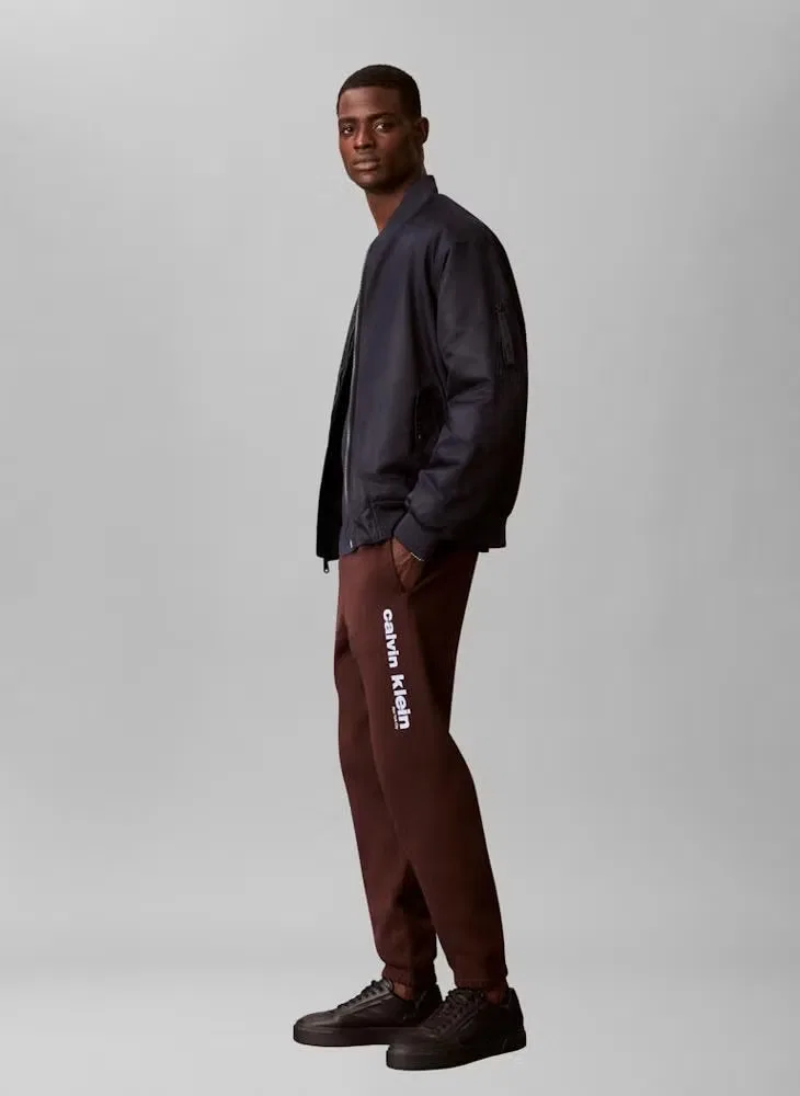 Штаны спортивные с ретро-принтом Graphic Retro Calvin Klein, коричневый — фото 3