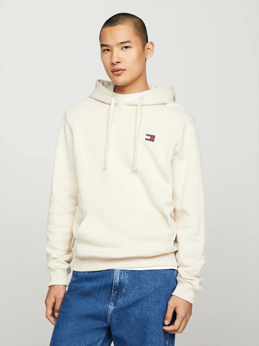 

Толстовка Tommy Jeans с капюшоном "TJM REG BADGE HOODIE EXT", со шнурком, цвет Newsprint