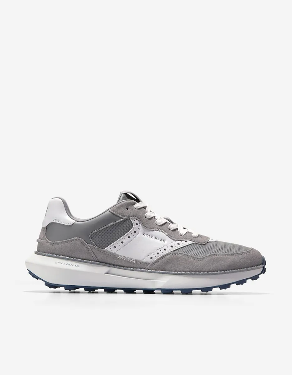 

Мужские кроссовки из кожи в беговом стиле с перфорированными деталями Cole Haan, серый