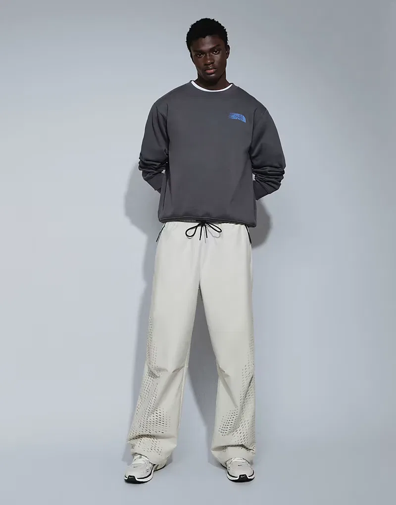 Спортивные брюки Nike Tech Shori с перфорацией и широкими штанинами, светло-бежевый