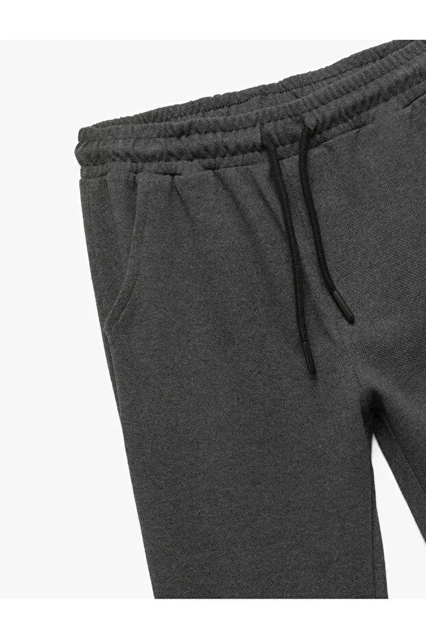 Детские спортивные штаны для мальчиков с принтом Basic jogger sweatpants with lace-up pockets at the waist Koton, Gray — фото 3