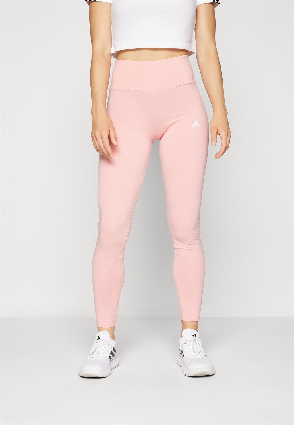 

Леггинсы Essentials High Waist Logo Leggings adidas Sportswear, полурозовые искры