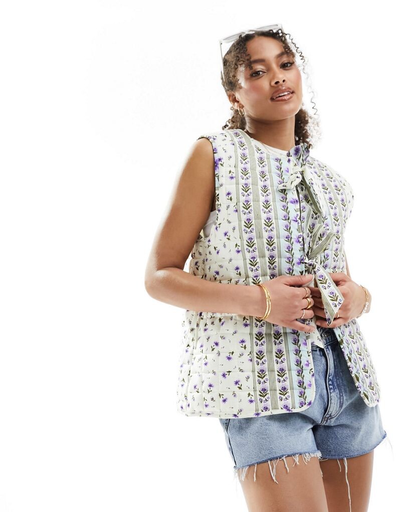 

Белый стеганый жилет с бантами ASOS DESIGN