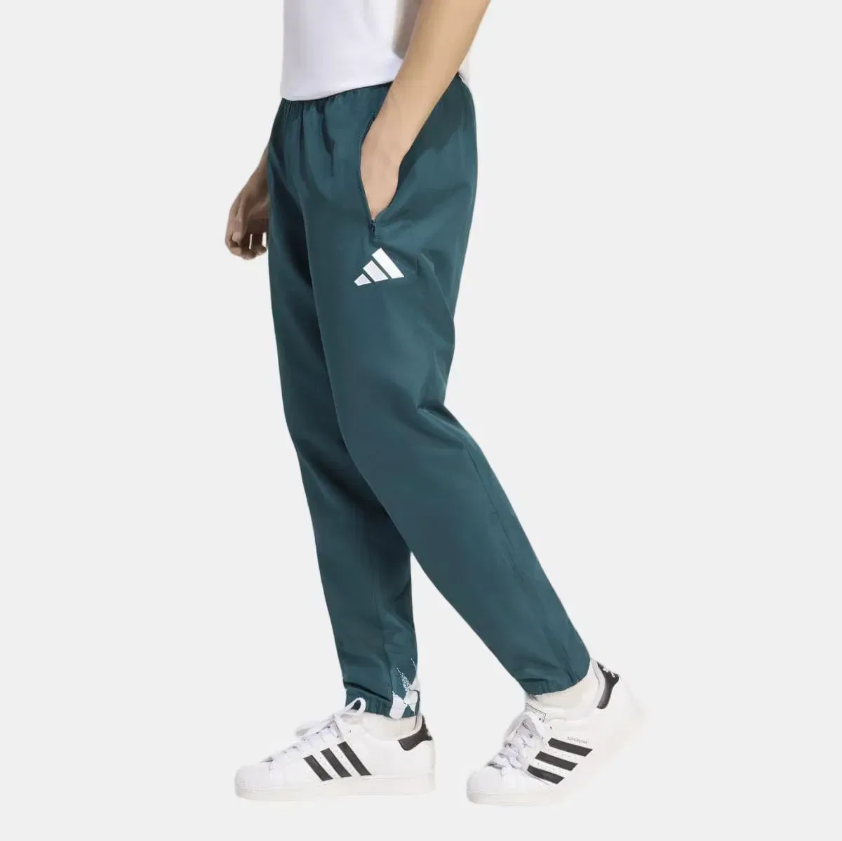 Мужские спортивные штаны с длинной штаниной Real Madrid CF 2026/2027 adidas, Темно-Зеленый