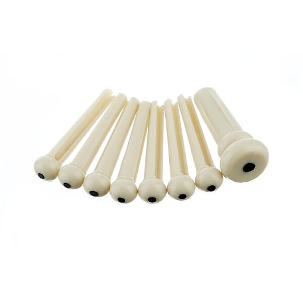 

Набор штифтов Fender Bridge цвета слоновой кости с черной точкой (7) Bridge Pin Set Ivory with Black Dot (7)