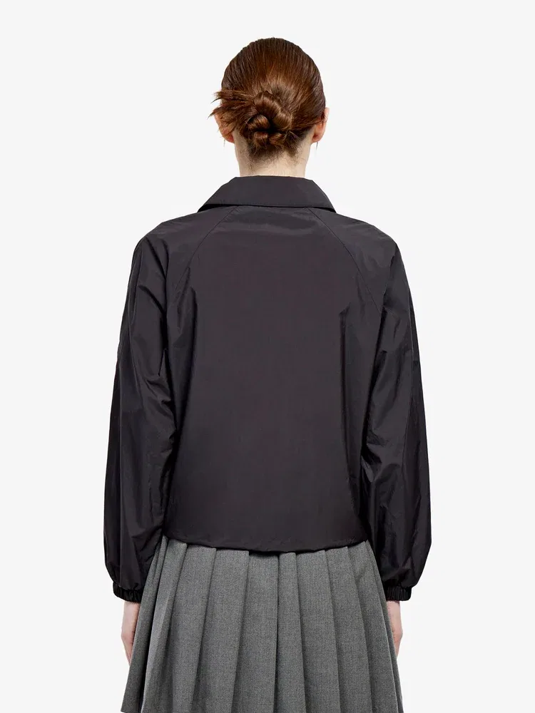 Пуховик женский LACOSTE Black, с воротником-стойкой, объемный — фото 3