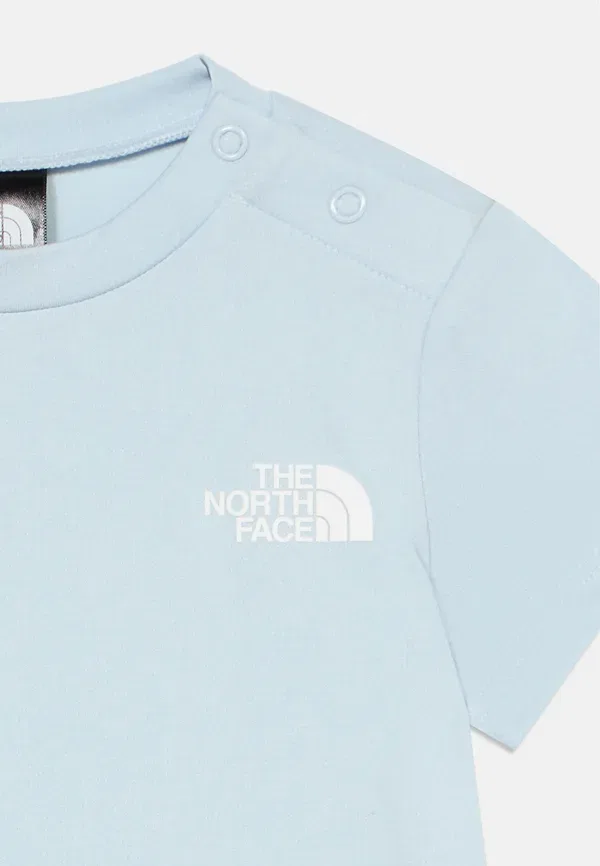 Комплект для девочки из куртки и шорт The North Face — фото 4
