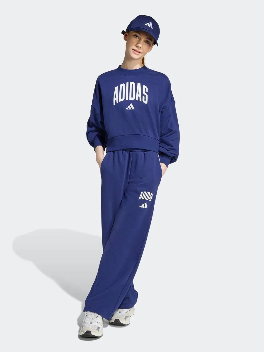 Спортивные брюки ADIDAS SPORTSWEAR с широкими штанинами, модель 'Essentials Collegiate', темно-синего цвета — фото 2